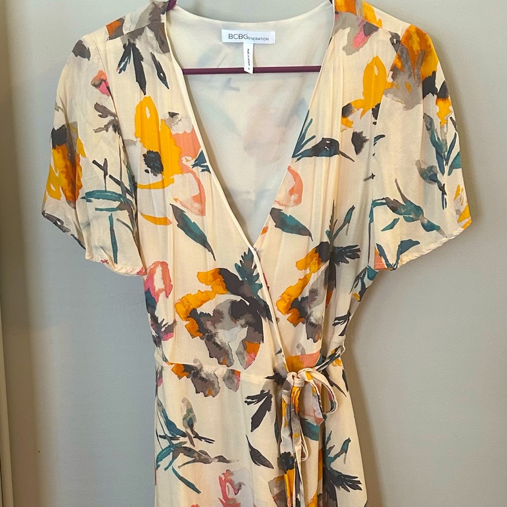 Cute wrap dress- multicolored flower print. Worn once.